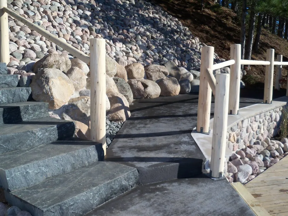 Local landscape installation for year-round maintenance in Minocqua, WI by Quality Grading And Landscaping