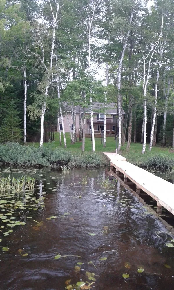 Top-rated garden landscaping with custom design in Minocqua, WI by Quality Grading And Landscaping