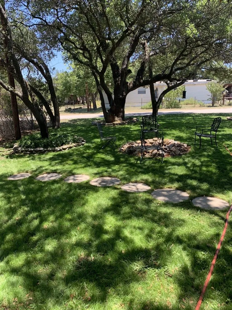 Custom landscape installation in Merkel, TX by Quality Grass Guys
