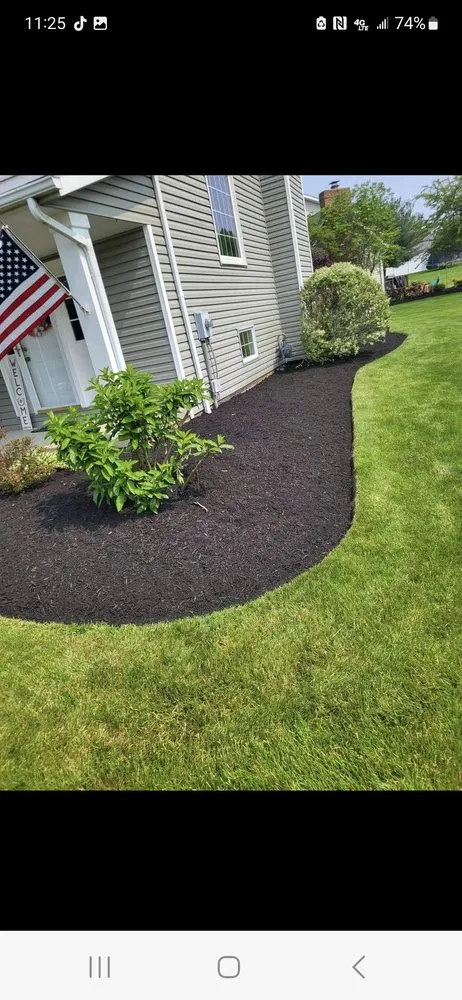 Professional yard maintenance with custom design in Canton, OH by Quality Groundskeeping