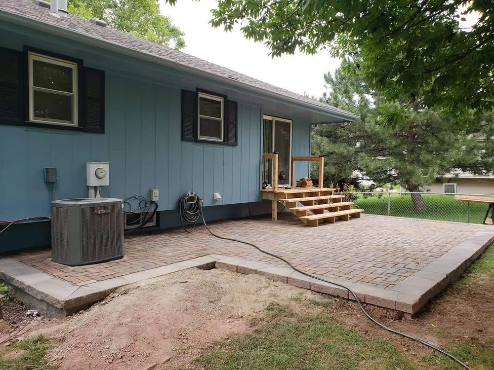 Affordable lawn care service for homes across Omaha, NE - Quality Hardscapes of Omaha