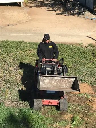 Custom lawn mowing service for outdoor upgrades in Los Osos, CA by Quality Hauling