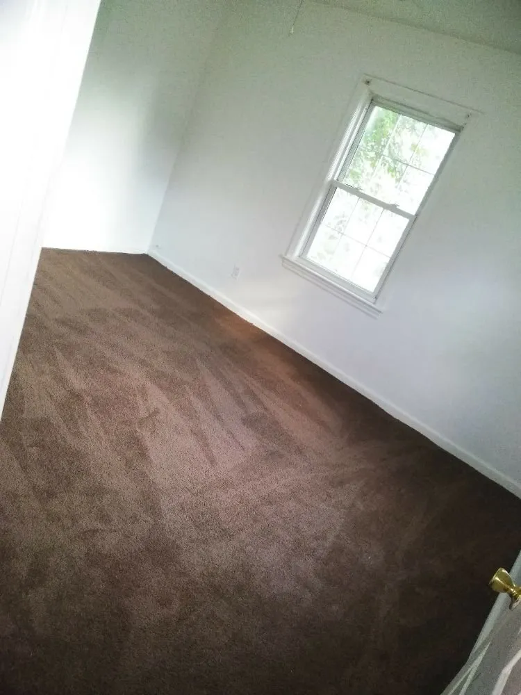 Affordable lawn mowing service for residential properties in Hampton, VA by Quality Home Cleaners