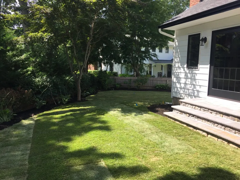 Expert yard maintenance with custom design across Huntington, NY - Quality Island Landscaping