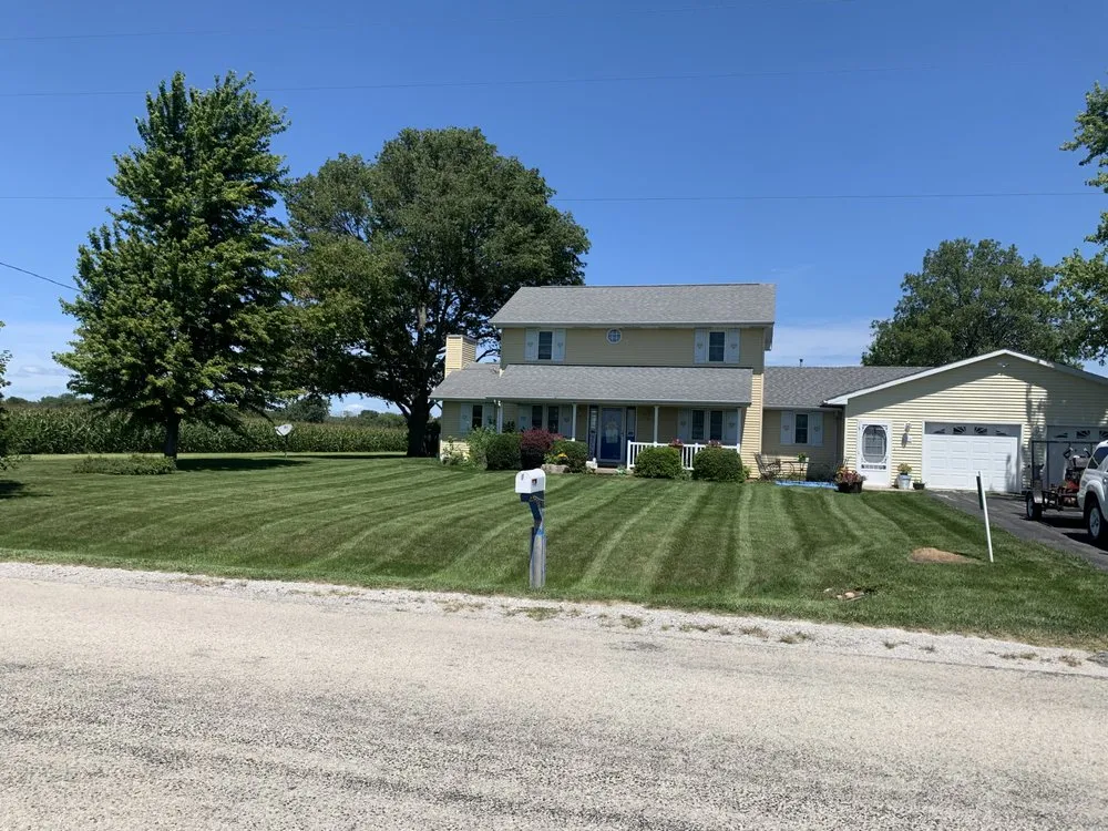 Professional lawn mowing service experts serving Decatur, IL - Quality Land Management