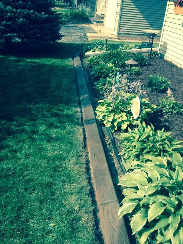 Expert yard maintenance for residential properties in Hastings, MN by Quality Landscape Curbing