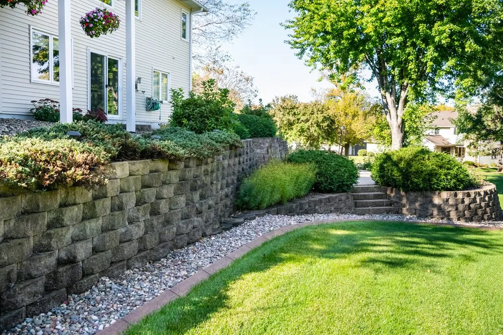 Local lawn mowing service for year-round maintenance in Hastings, MN by Quality Landscape Curbing