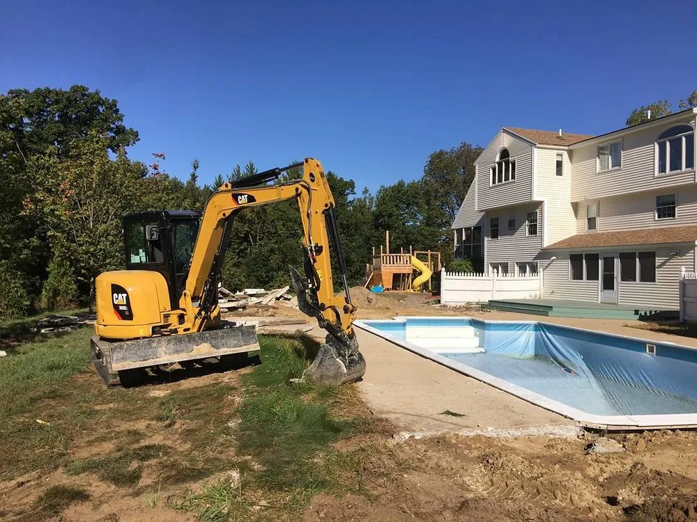 Custom landscaping services for year-round maintenance in Manchester, NH by Quality Landscaping