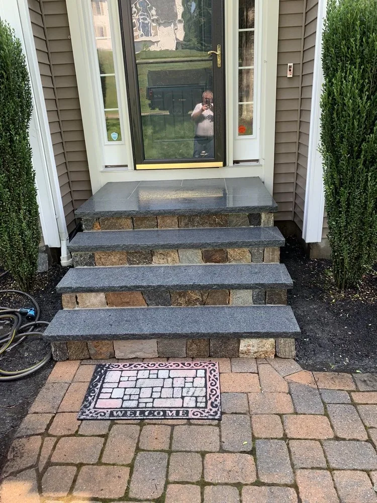 Local lawn mowing service with custom design across Stoneham, MA - Quality Landscaping