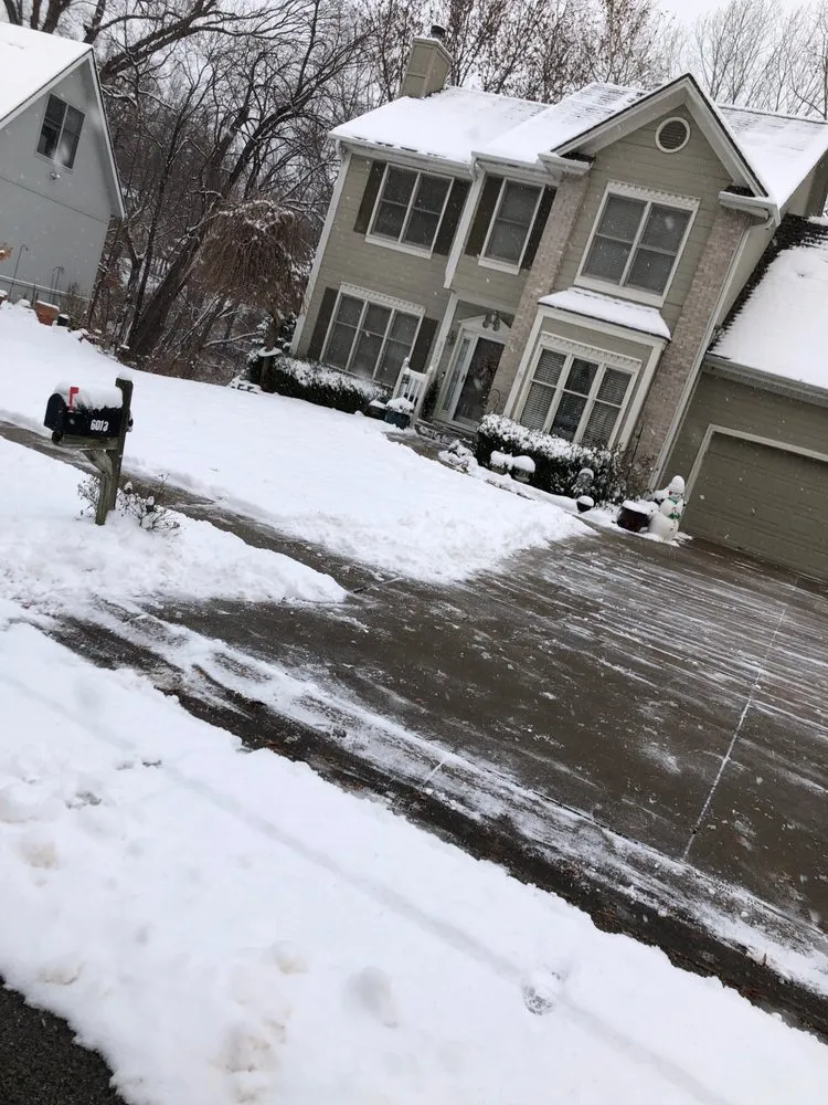 Expert lawn mowing service for year-round maintenance across Kansas City, MO - Quality Lawn and Landscape Bros