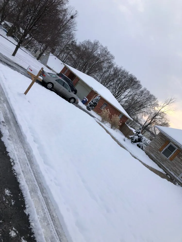 Trusted lawn mowing service experts serving Kansas City, MO - Quality Lawn and Landscape Bros