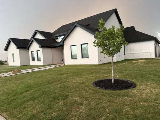 Quality Lawn Care Logo