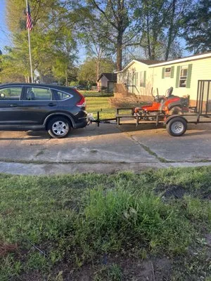 Quality Lawn Care By Mike Logo