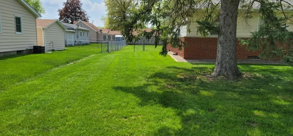 Top-rated garden landscaping with custom design in Clinton Center, IA by Quality Lawn Care