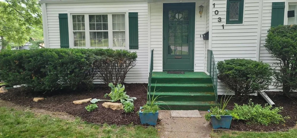Trusted lawn mowing service for year-round maintenance in Clinton Center, IA by Quality Lawn Care