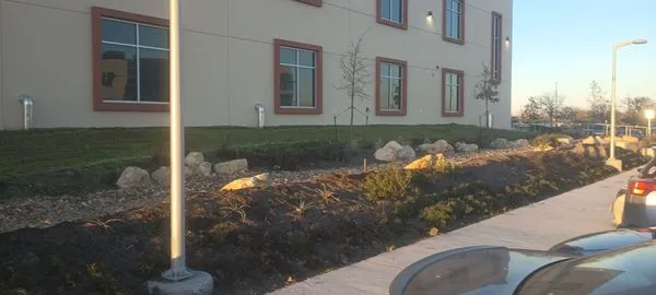 Quality Lawn Care Services Logo