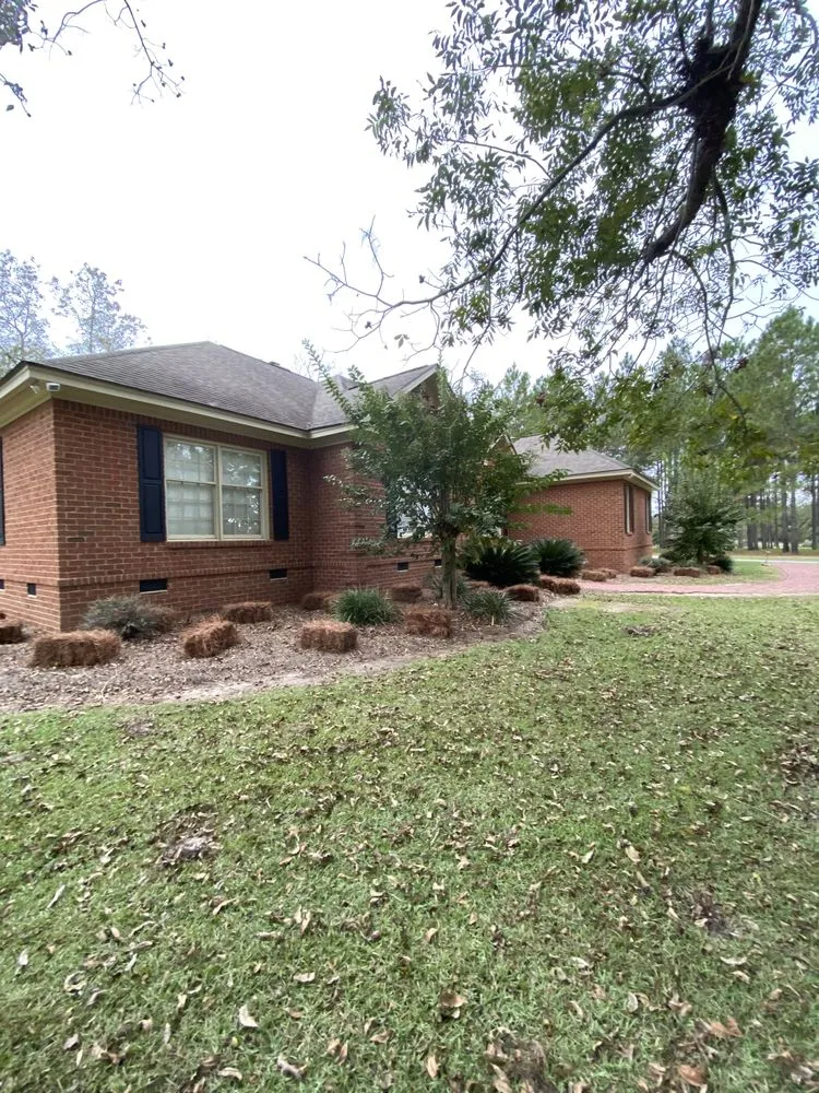 Top-rated yard cleanup service for residential properties in Tifton, GA by Quality Lawn Care Services