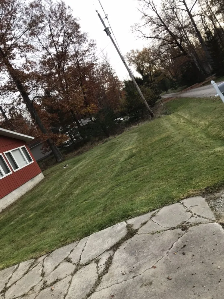 Top-rated residential landscaping with custom design in Spruce, MI by Quality Lawn Care