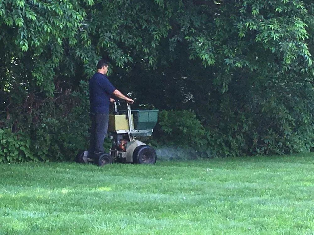 Professional lawn mowing service for outdoor upgrades in Norwalk, CT by Quality Lawn Service