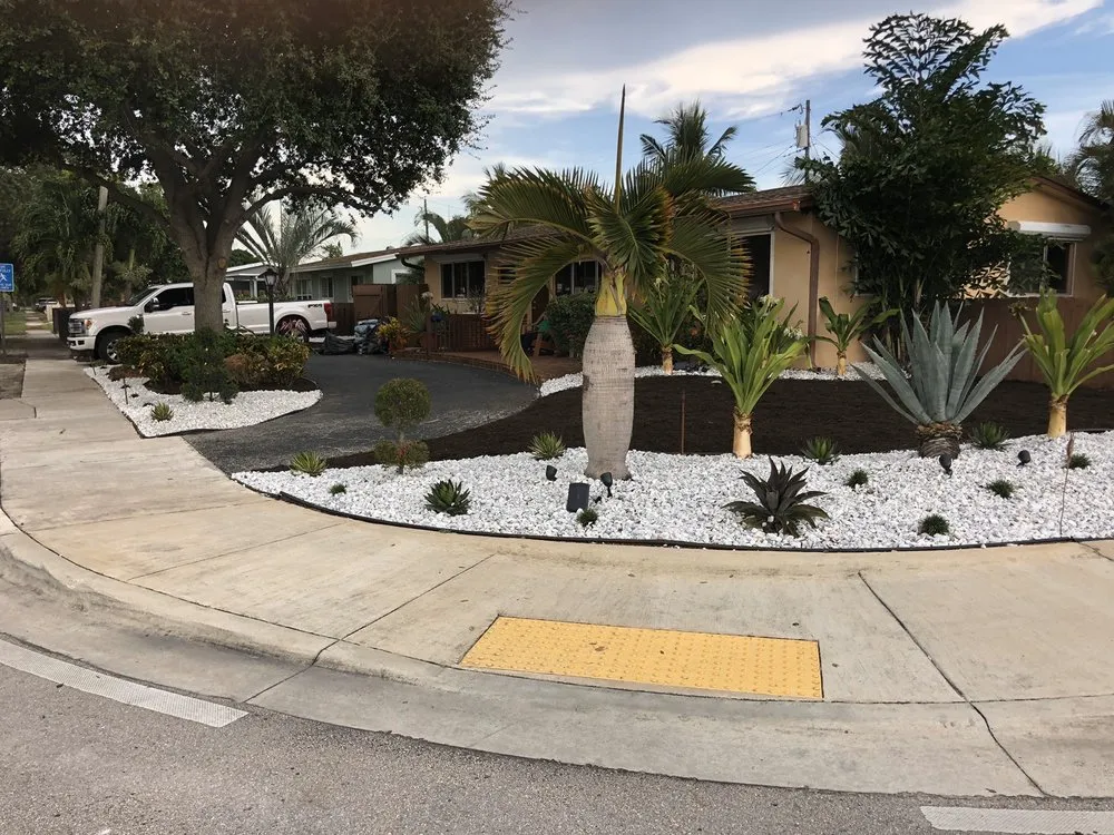 Expert lawn care service with custom design in Deerfield Beach, FL by Quality Lawncare & Landscaping