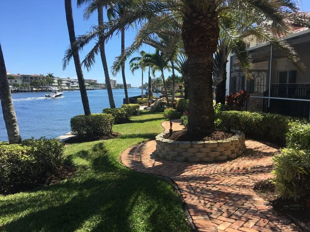 Custom residential landscaping in Deerfield Beach, FL by Quality Lawncare & Landscaping
