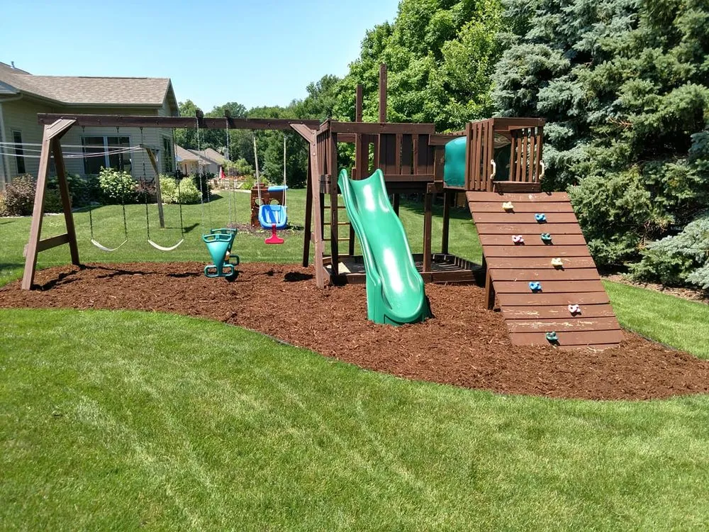 Expert lawn mowing service for year-round maintenance in Little Chute, WI by Quality Lawncare and Landscape