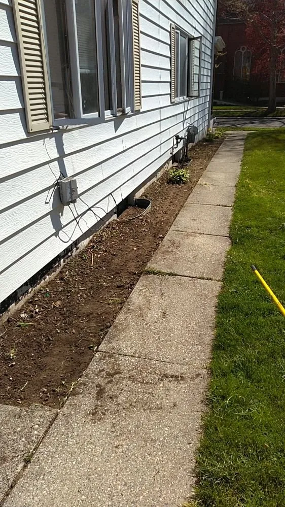 Custom outdoor landscaping experts serving Zeeland, MI - Quality Lawncare Landscaping and Snowplowing
