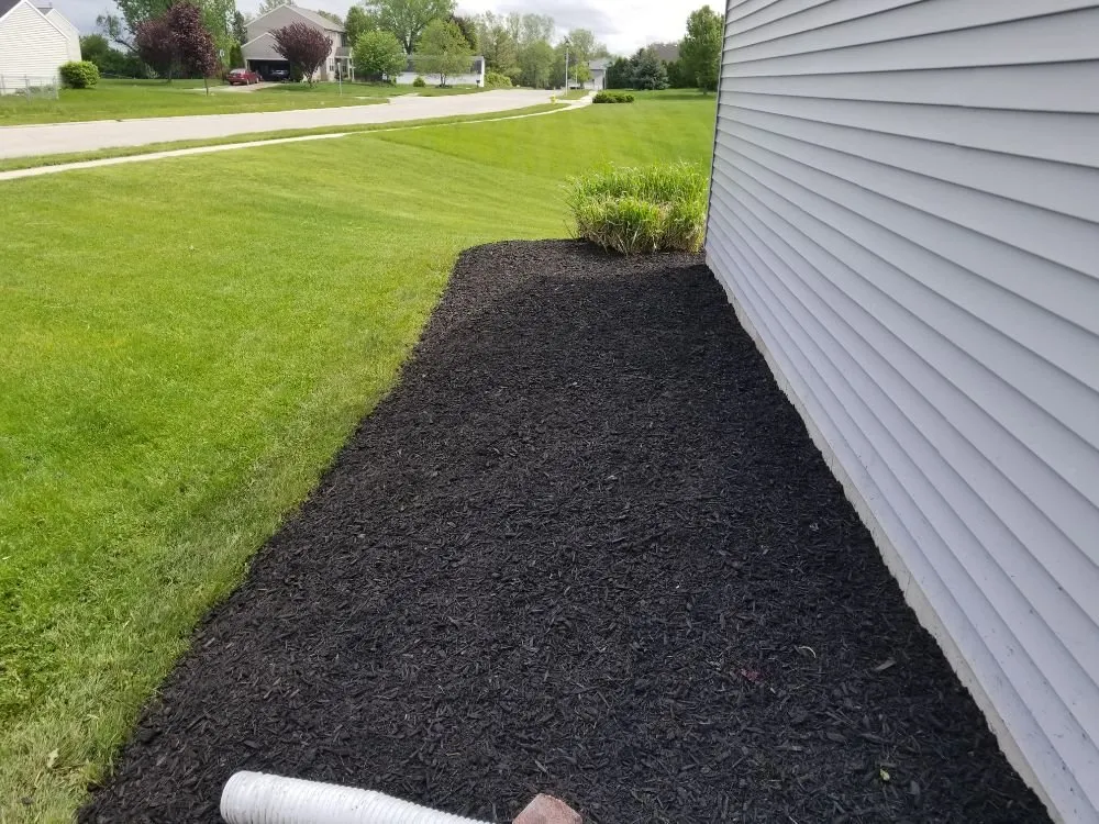 Expert yard maintenance for beautiful yards in Zeeland, MI by Quality Lawncare Landscaping and Snowplowing