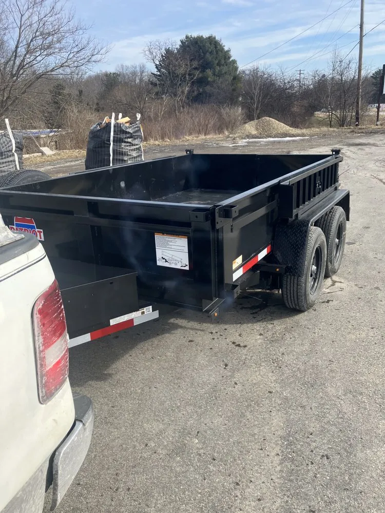 Affordable lawn mowing service for homes in Erie, PA by Quality Maintenance & Landscaping