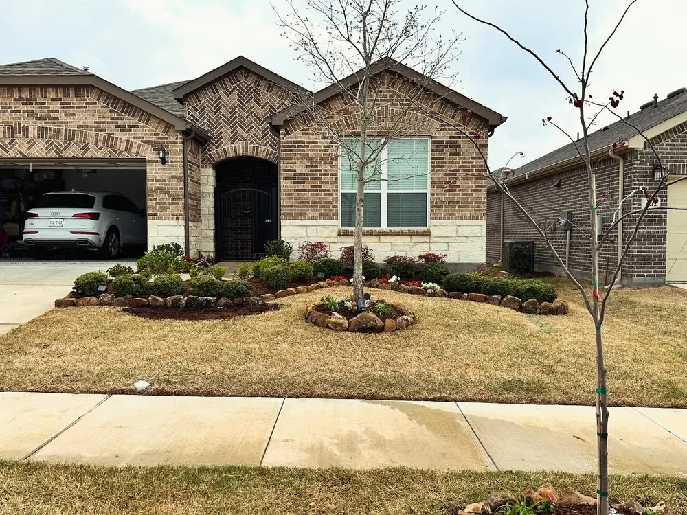 Professional yard maintenance for residential properties in Frisco, TX by Quality Outdoor Solutions