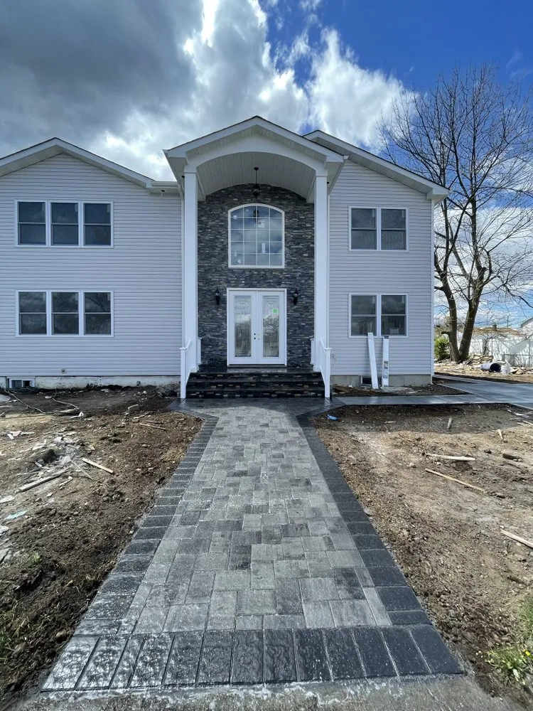 Affordable lawn mowing service in Copiague, NY - Quality Pavers Construction