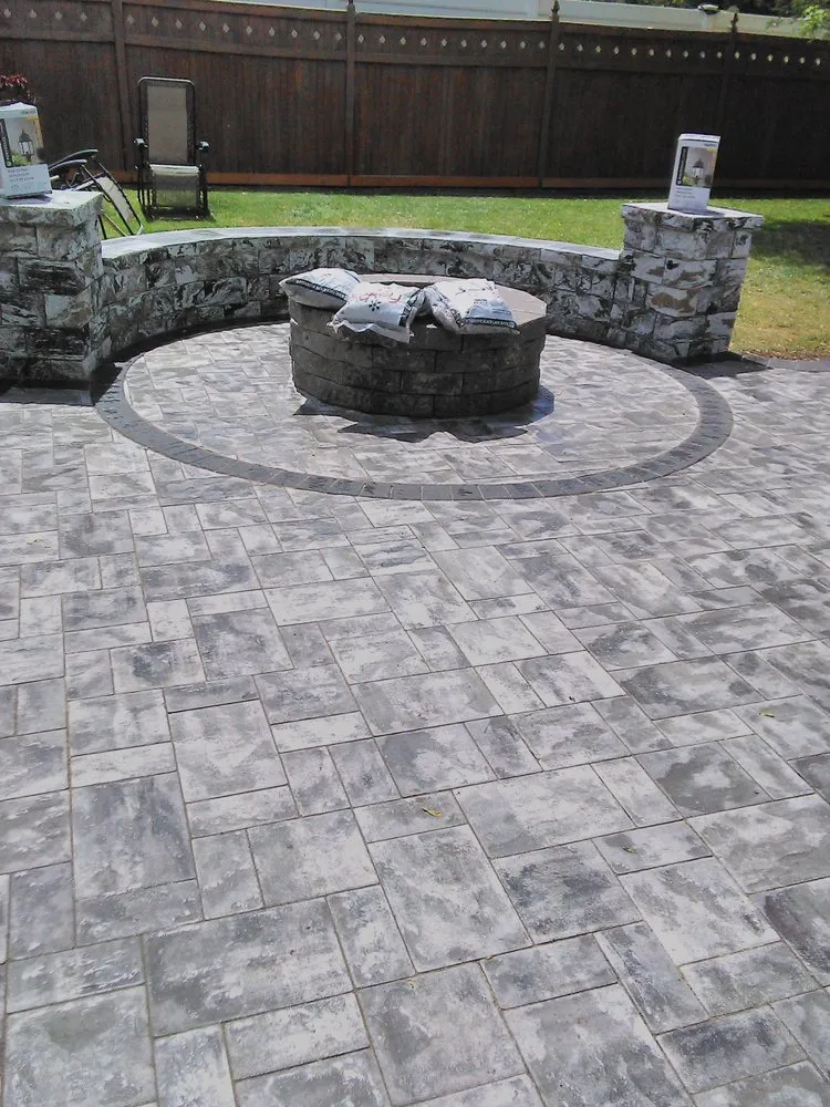 Affordable lawn care service with custom design in Copiague, NY by Quality Pavers Construction