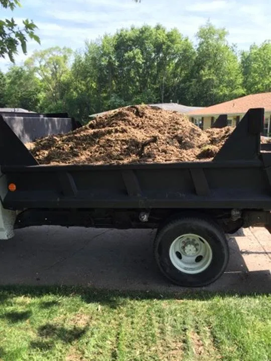 Local residential landscaping for year-round maintenance in Portage, IN by Quality Stump Grinding & Landscape Services