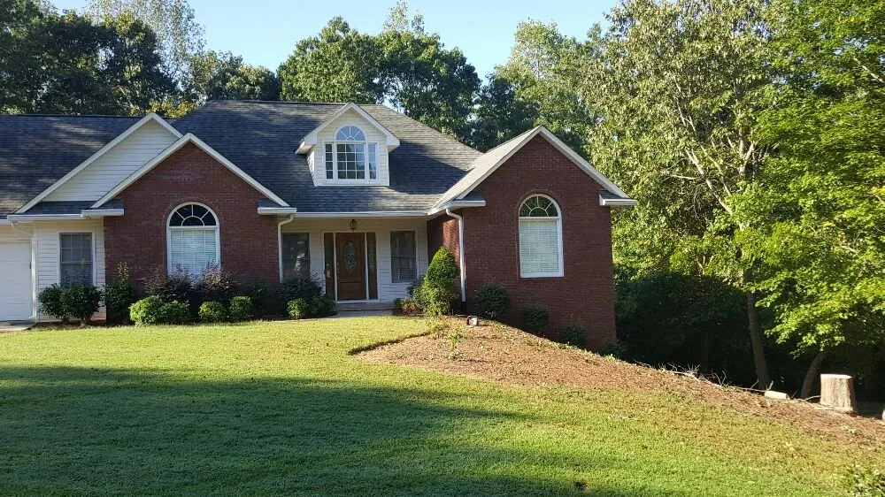 Local landscape design with custom design in Flowery Branch, GA by Quality Tree Surgeons