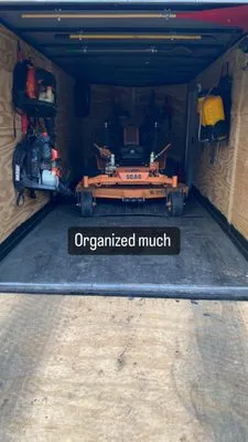 Quan’s Lawn Care Logo