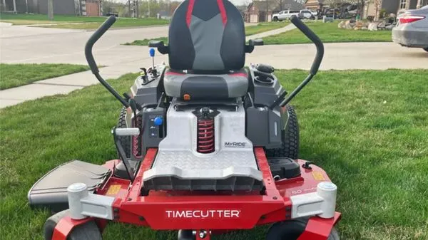 Quans Mowing & Weed Eating Logo