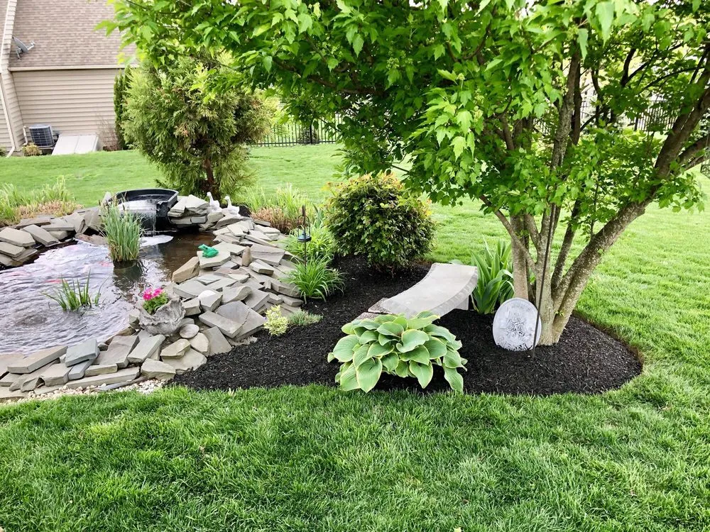 Custom landscape design in Lower Paxton Township, PA by Quartmon’s Landscaping