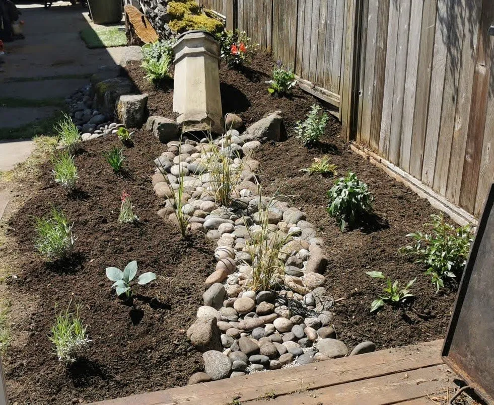 Custom lawn mowing service for outdoor upgrades in Lutz, FL by QUE TUANIS Landscaping & Woodwork