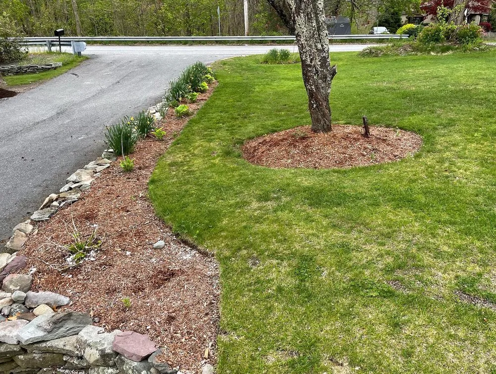 Custom yard maintenance for residential properties across Bellevue, OH - Quest Landscapes Ohio