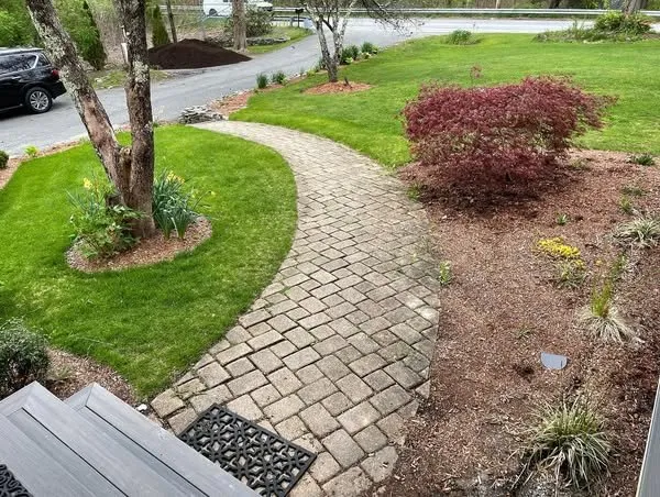 Reliable lawn mowing service with custom design in Bellevue, OH by Quest Landscapes Ohio