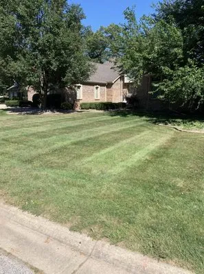 Quick & Clean Lawn Care Service Logo