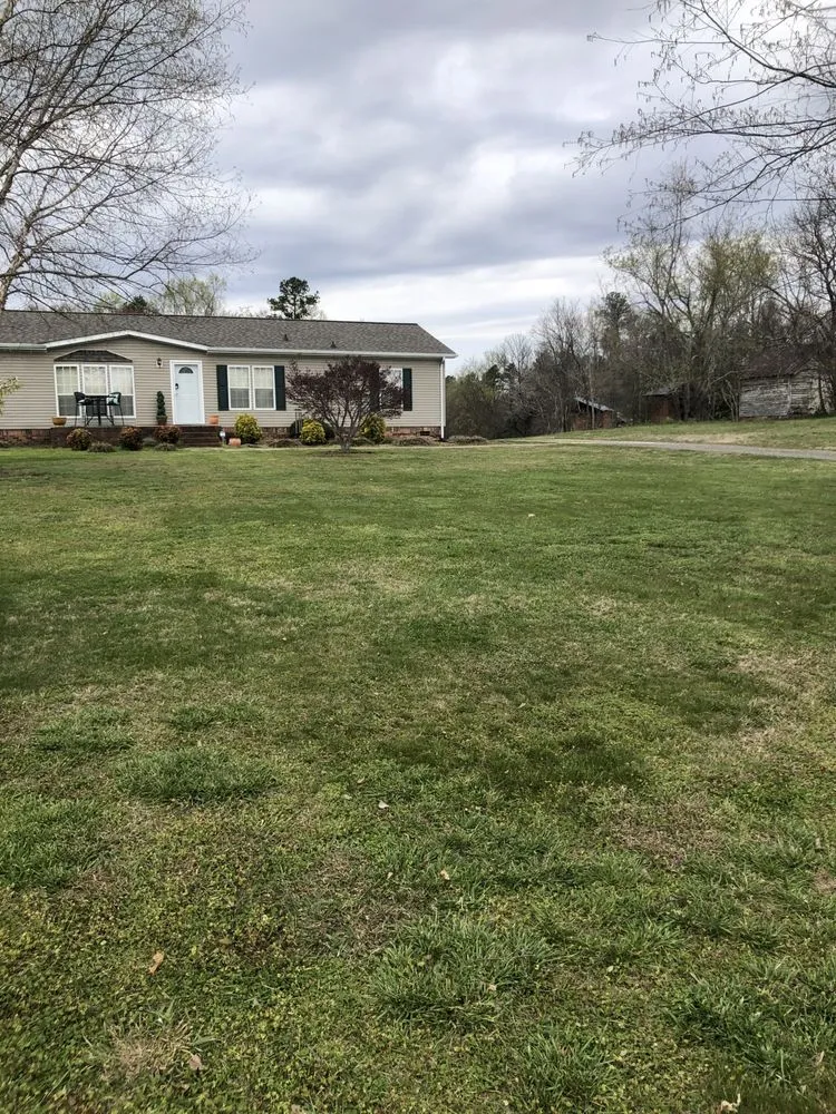 Professional landscape installation with custom design across Advance, NC - Quick Cut Lawn Care