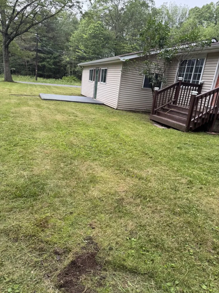 Expert lawn care service with custom design in Stroudsburg, PA by Quick Fix