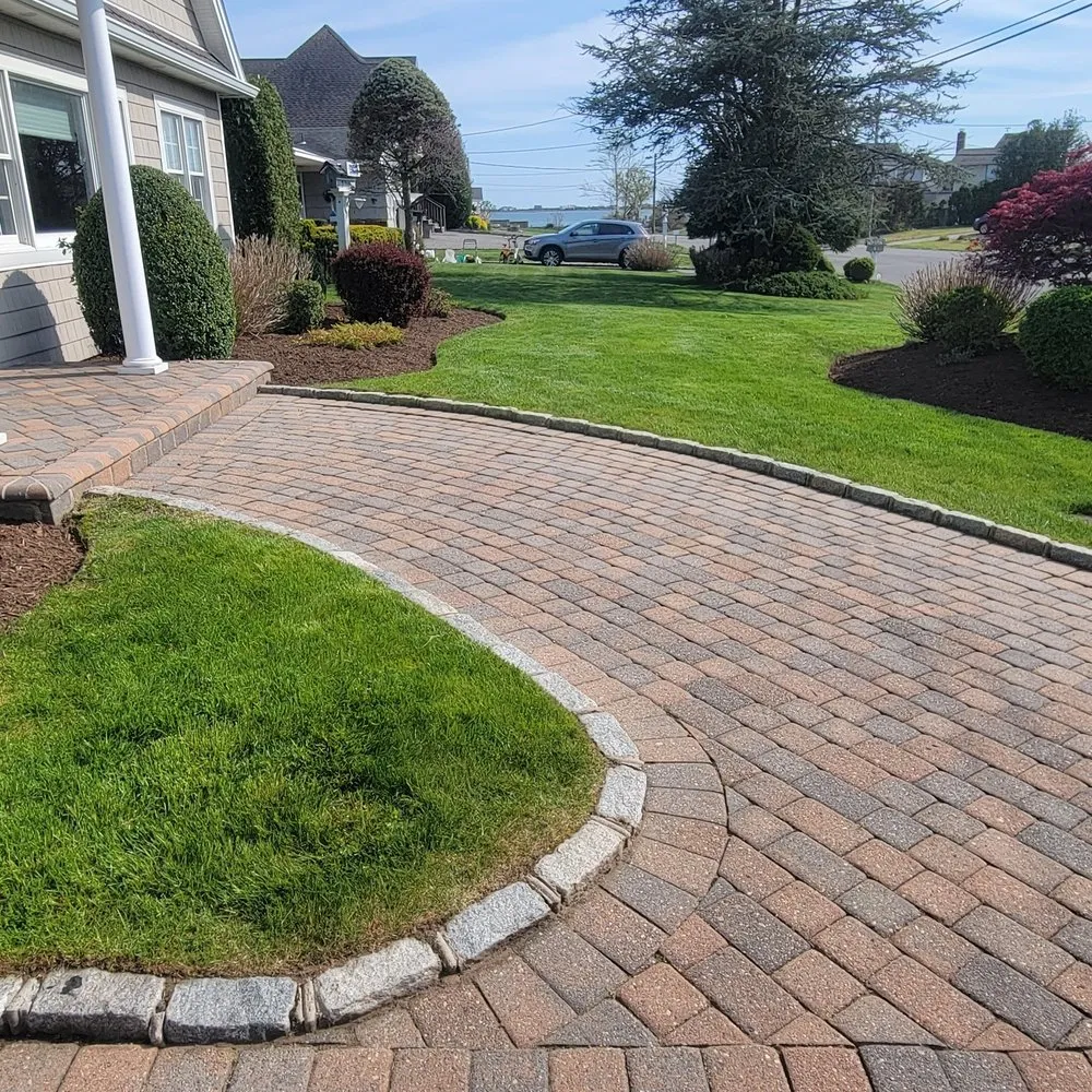 Trusted lawn care service with custom design in Hampton Bays, NY by Quick Solution Property Care