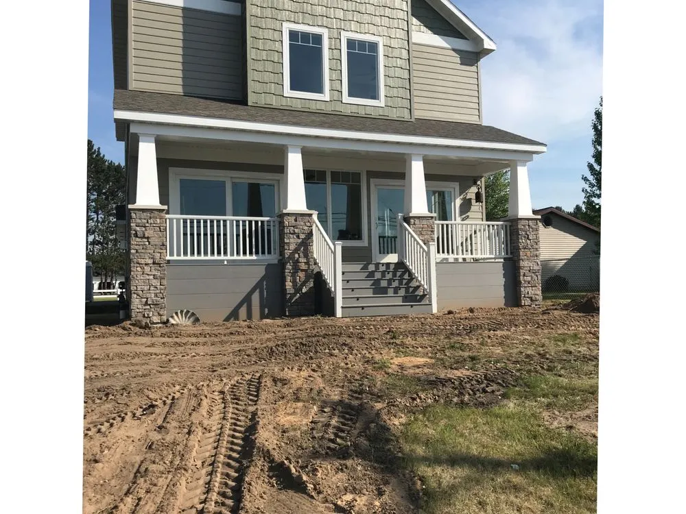 Affordable landscape installation for residential properties in Cadillac, MI by Quicklawn Hydroseeding