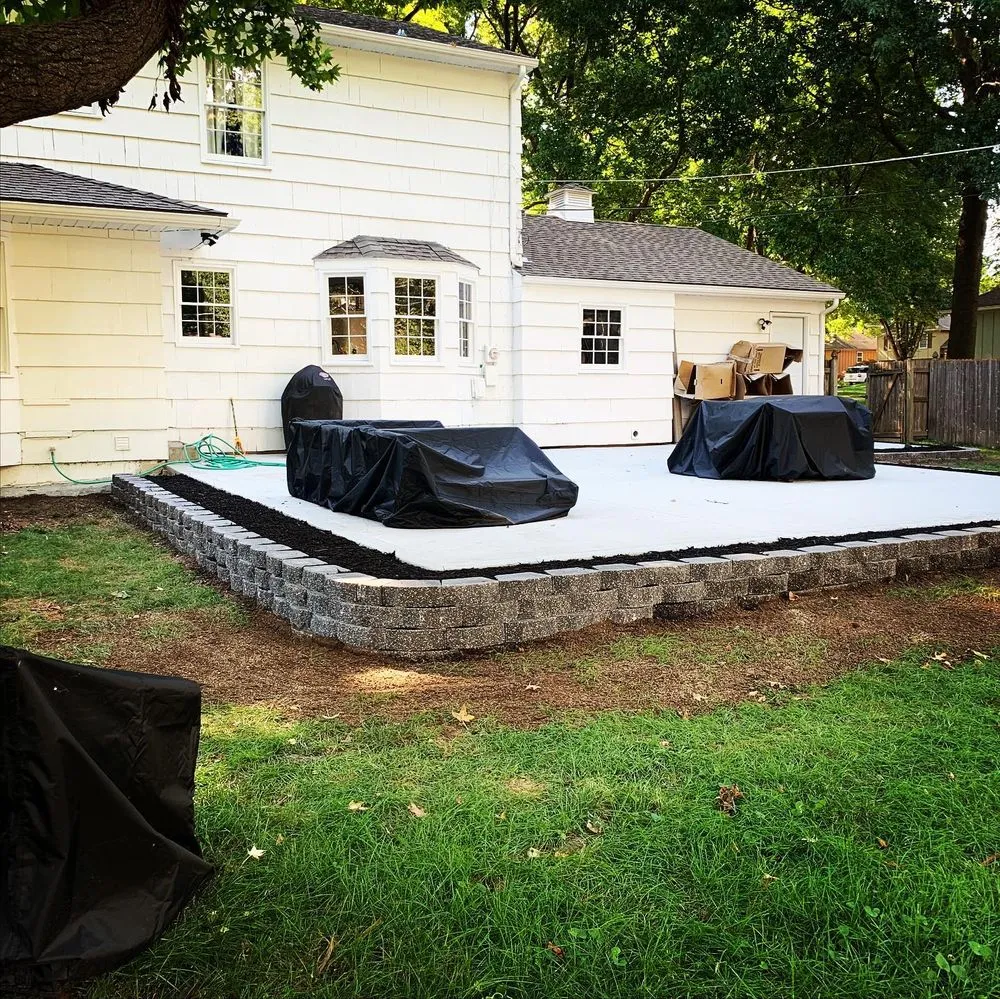 Professional yard cleanup service in Overland Park, KS by Quick's Lawn Maintenance