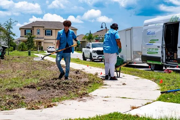 Quiet Guys Lawn Care Logo