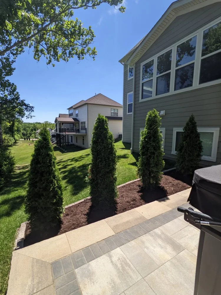 Custom yard cleanup service for outdoor upgrades in St. Louis, MO by Quiet Village Landscaping