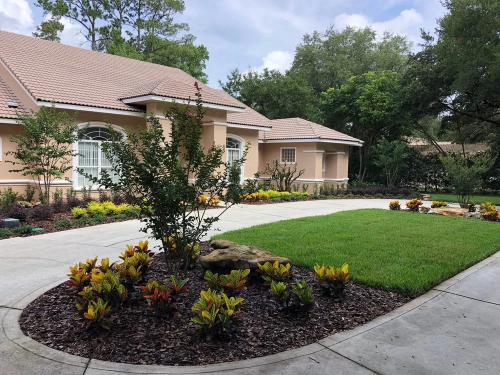 Custom garden landscaping with custom design in Longwood, FL by Quik Care Services