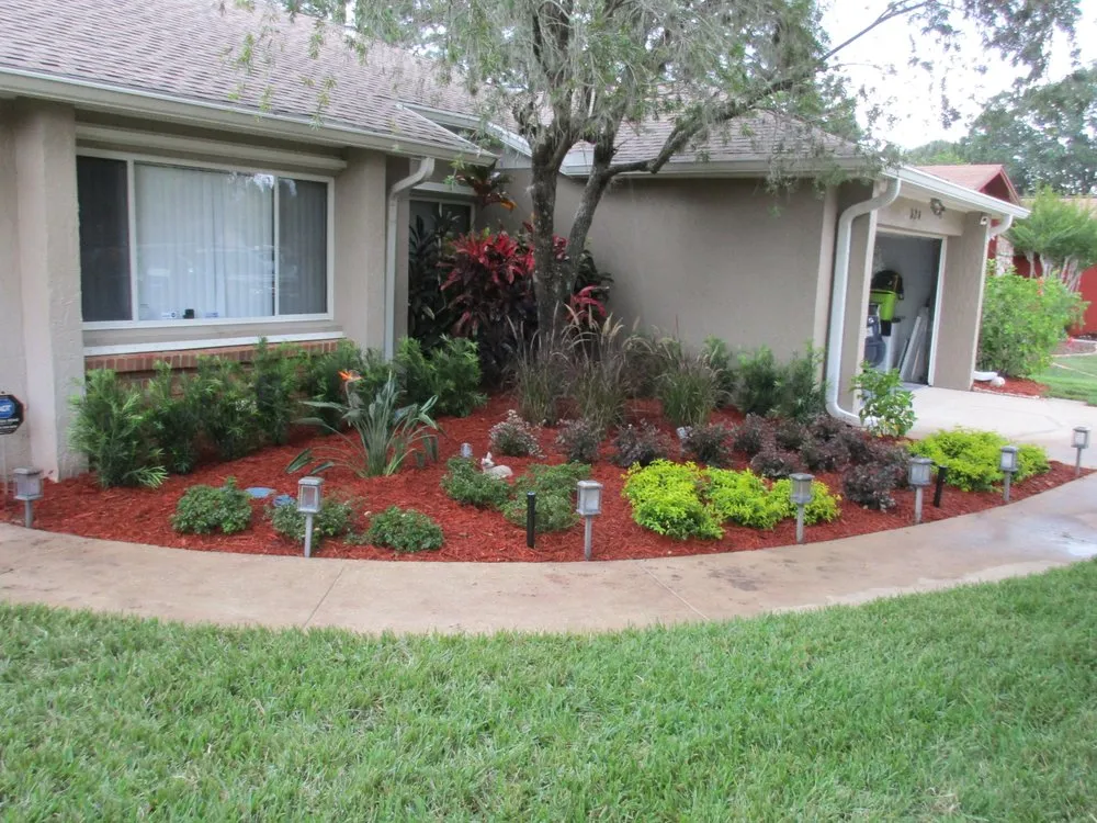 Expert landscaping services for year-round maintenance in Longwood, FL by Quik Care Services